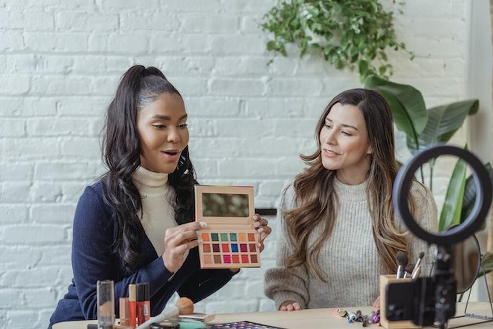 two make-up gurus collaborating on a video